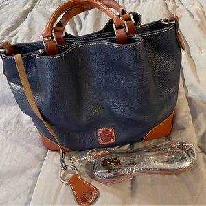 Navy Barlow tote with crossbody strap and leather keychain